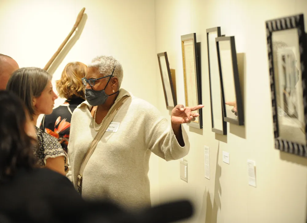 Visitors of Cargill Gallery experience the TESTIFY exhibit 