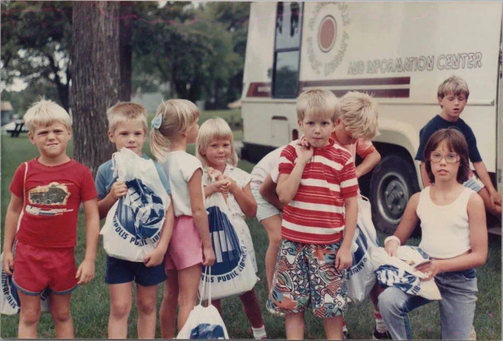 Children after a visit to the bookmobile, 1980s-90s