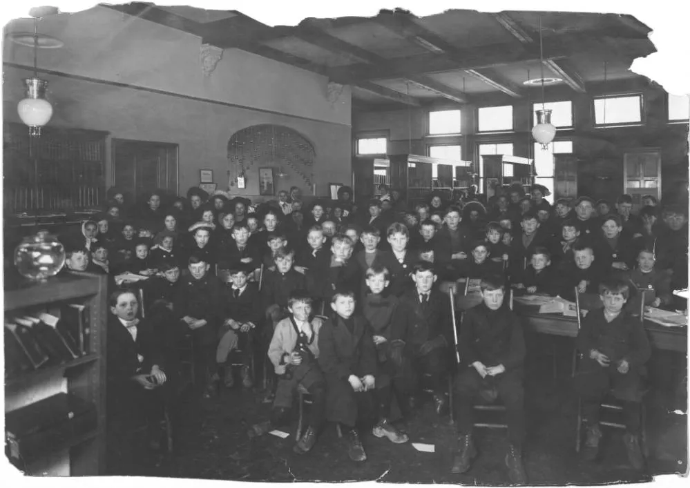 Children’s story hour at unknown location, 1890s