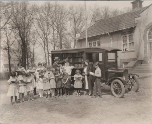 The county book wagon visits the Wood Lake School, 1920s
