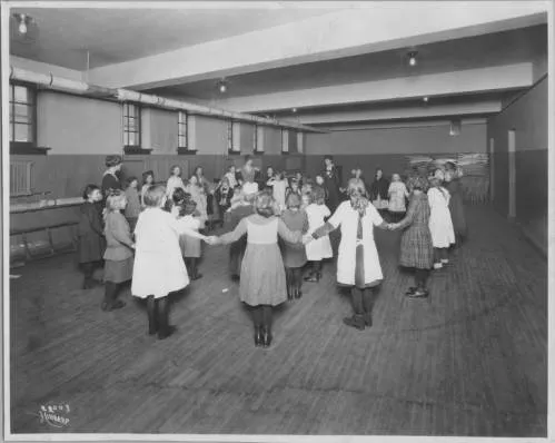 A children's program at the Seven Corners Library in the 1910s