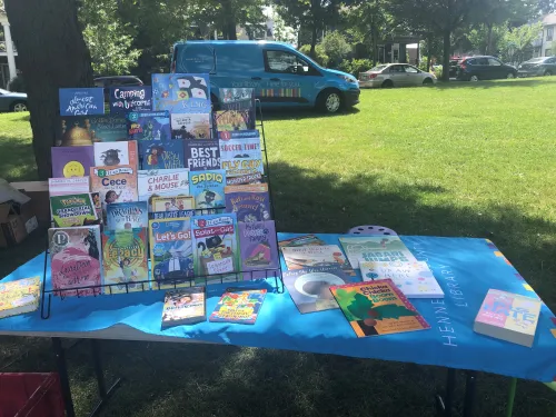 Table in the park with children's books