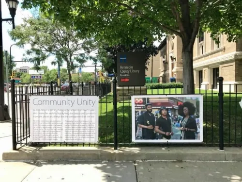 Art from the Community Unity Project hung on the fence outside Franklin Librart