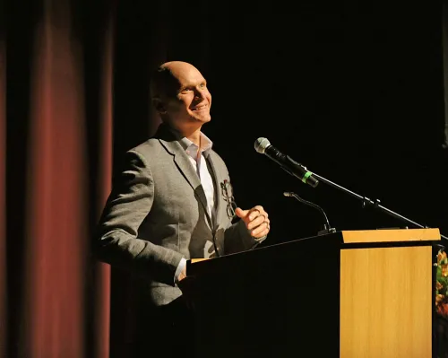 Anthony Doerr smiling on Pen Pals stage