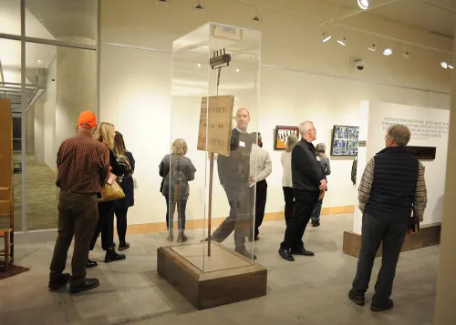 Visitors of Cargill Gallery experience the TESTIFY exhibit 