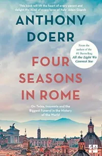 Book cover showing a blue sky over the Rome cityscape
