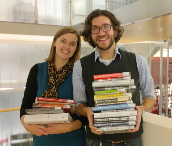 Librarians holding books