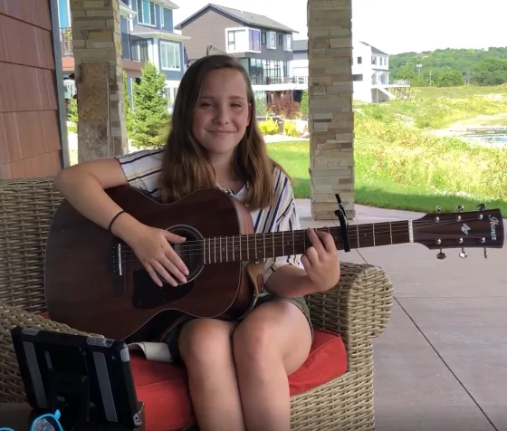 Shea Morrey playing guitar