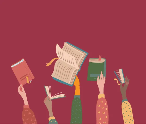 Hands of diverse group of people holding books up