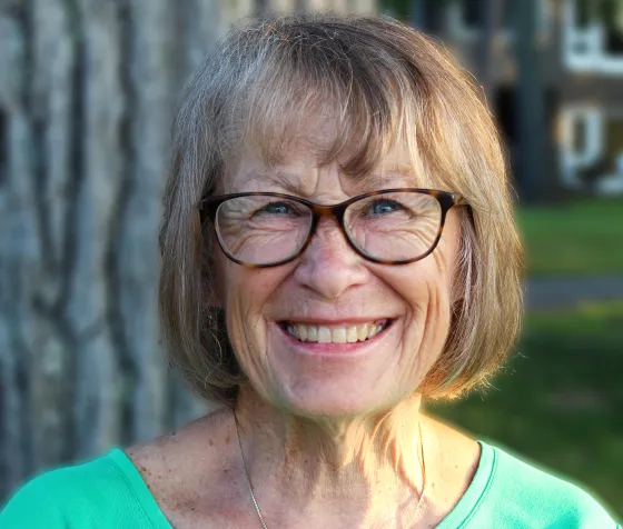 Patty Wetterling poses outdoors, smiling. 