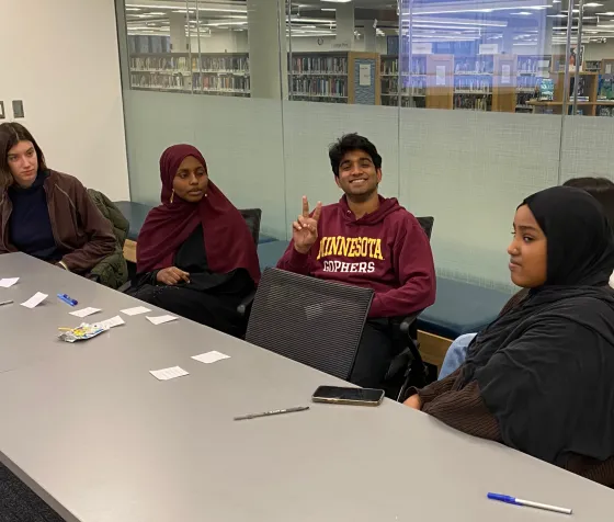 Members of the 2023-24 LYAC in discussion at Ridgedale Library. 