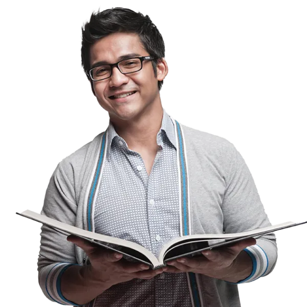 Man wearing glasses reading a book