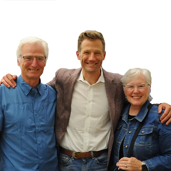 Author Steve Grove with two fans