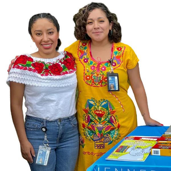 Two librarians smiling