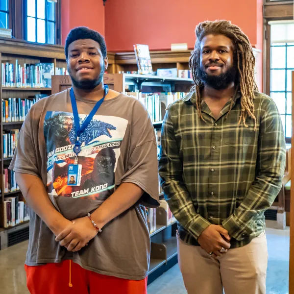 Johnny and Tommy posing for a photo at Sumner Library 